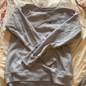 Champion size medium gray crewneck that just says champion on the top